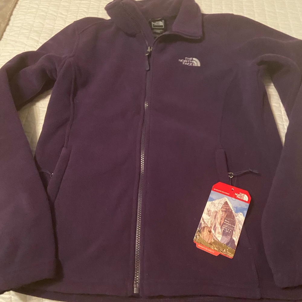 Brand new The North Face purple jacket, size medium, never worn